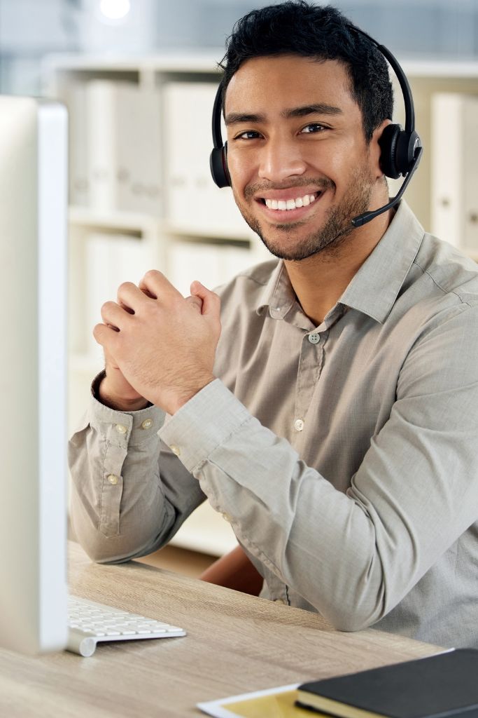 IT support staff equipped with headsets and monitors, ready to assist with any banking-related IT issues.