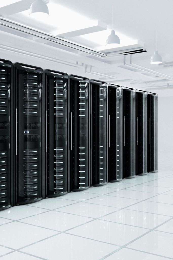 A data server room filled with high-tech servers, illustrating the backbone of IT infrastructure supporting government data management.