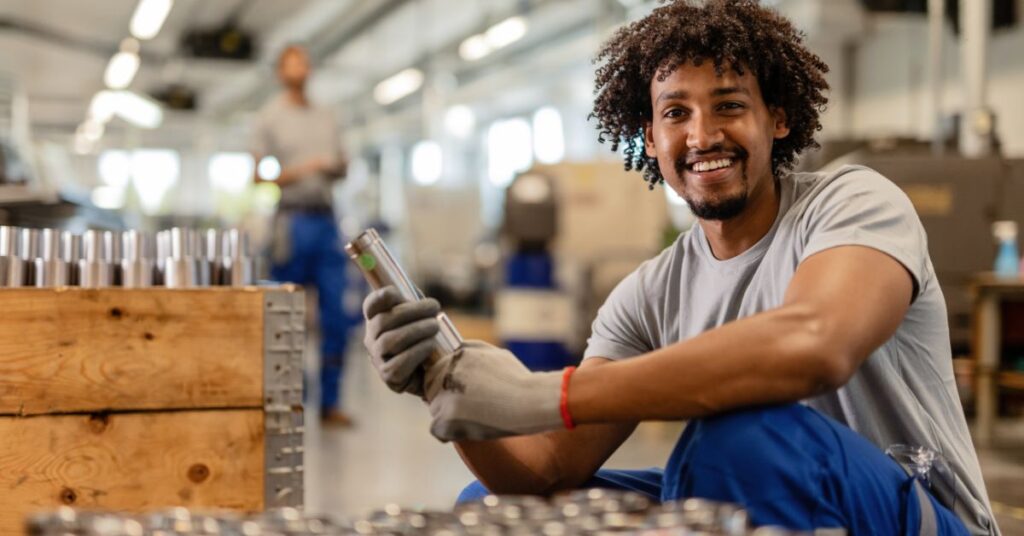 A technician from IT GOAT implementing IT infrastructure solutions in a manufacturing plant.