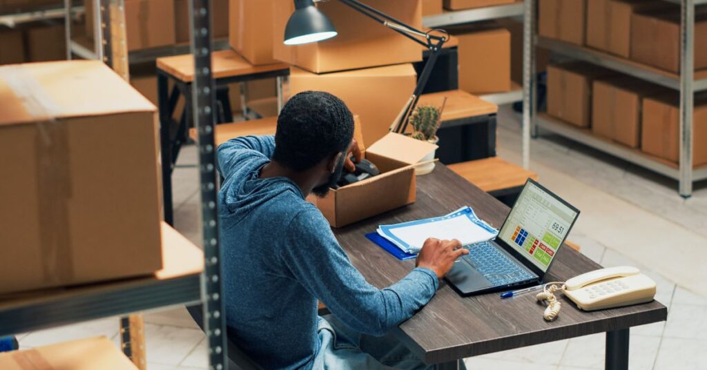 Business owner managing supply chain vendors with smart strategies to prevent cyberattacks, supported by IT GOAT's proactive vendor risk management solutions.