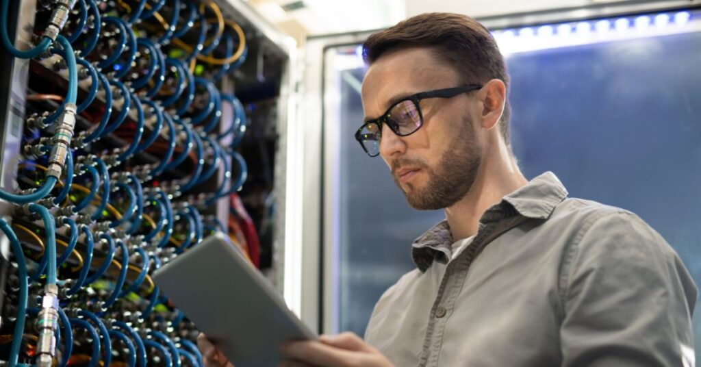 IT GOAT technician managing network infrastructure to ensure compliance and security for nonprofit organizations.