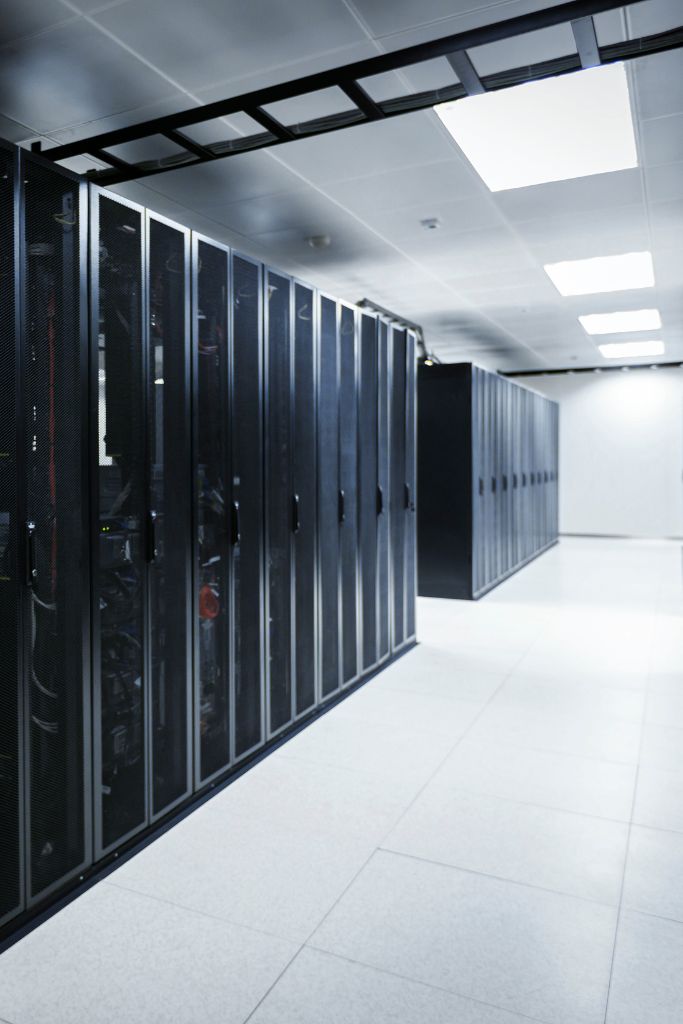 A modern data center in Louisville, representing outsourced IT infrastructure management. Our expert team handles everything from server maintenance to network support, ensuring local businesses can focus on their core operations